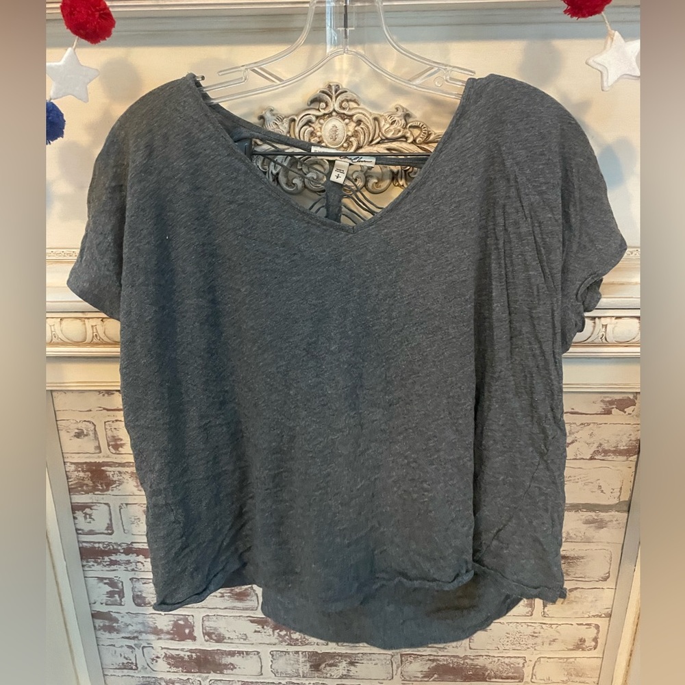 Grey open back shirt
